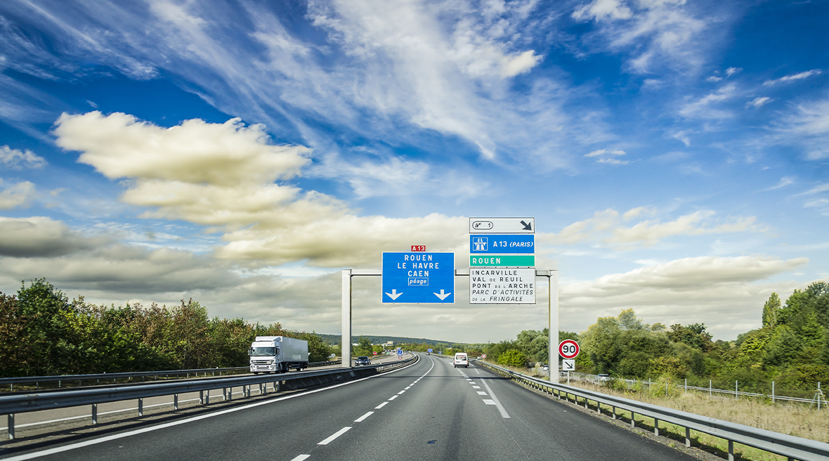 view of a motorway in France with road signs and speed markings